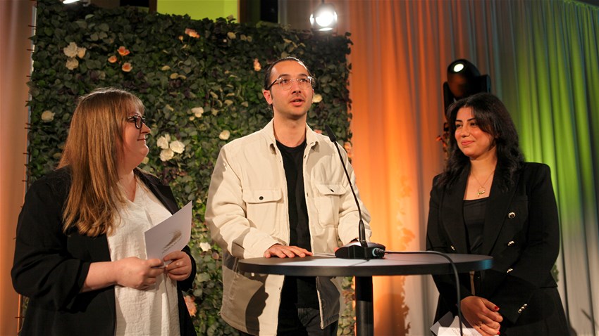 Students speaking in stage