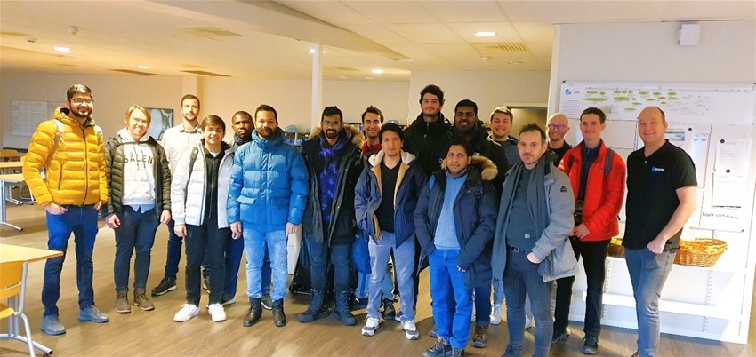 A group of students visiting a company.