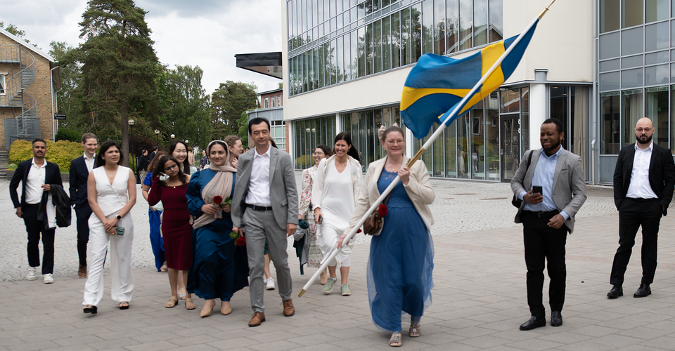swedish flag and students outside