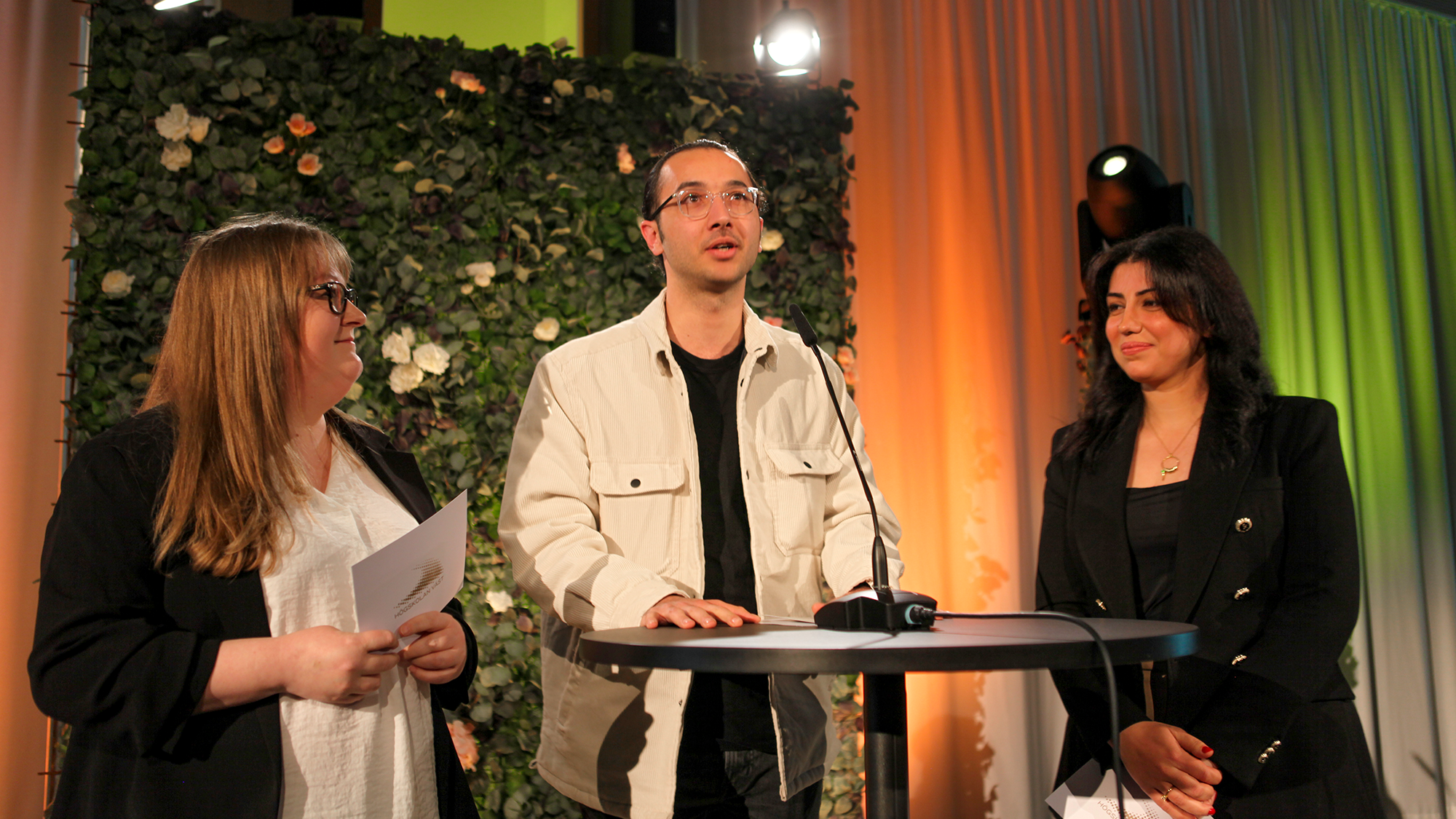 Students speaking in stage